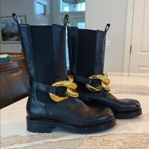 Elegant Black Boots with Gold Chain Detail
